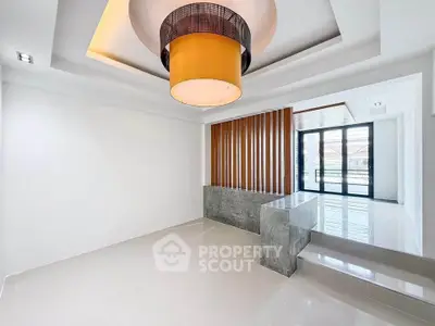 Modern minimalist interior with stylish lighting and sleek flooring