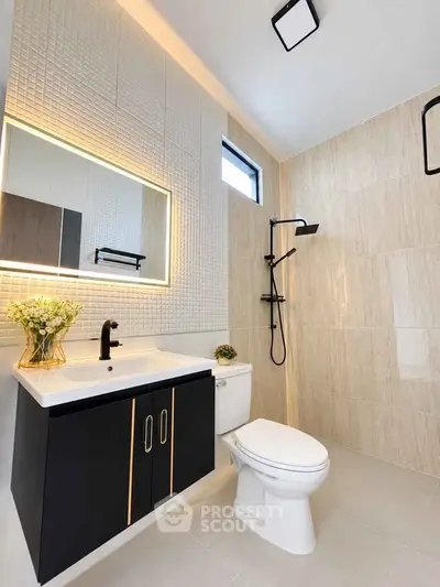 Modern bathroom with sleek fixtures and elegant lighting