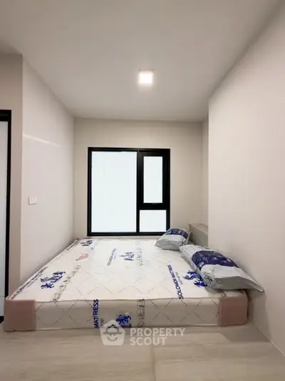 Minimalist bedroom with modern design and natural light