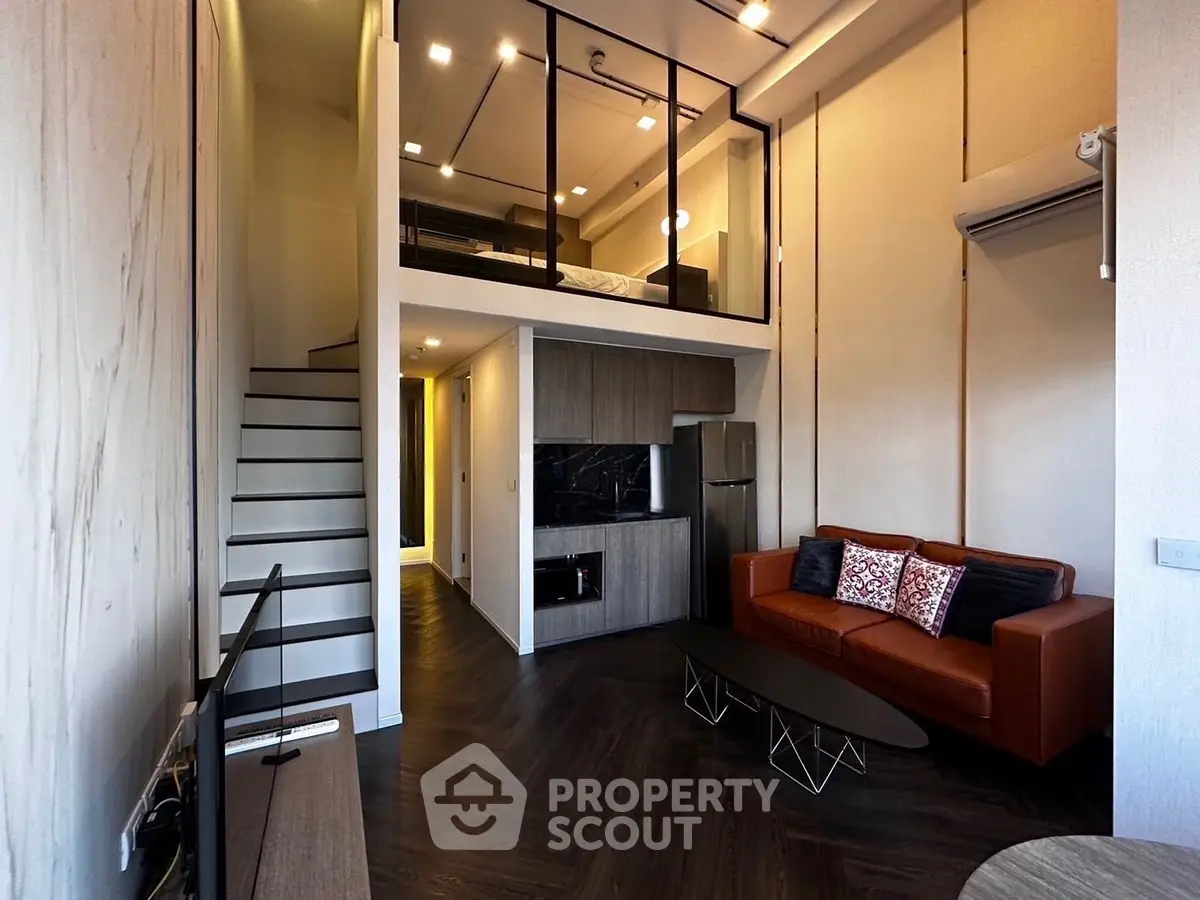 Modern loft apartment with stylish living room and mezzanine bedroom