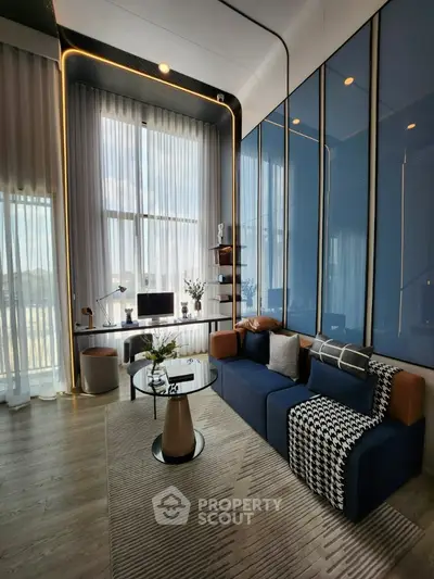 Luxurious modern living room with high ceilings and elegant decor