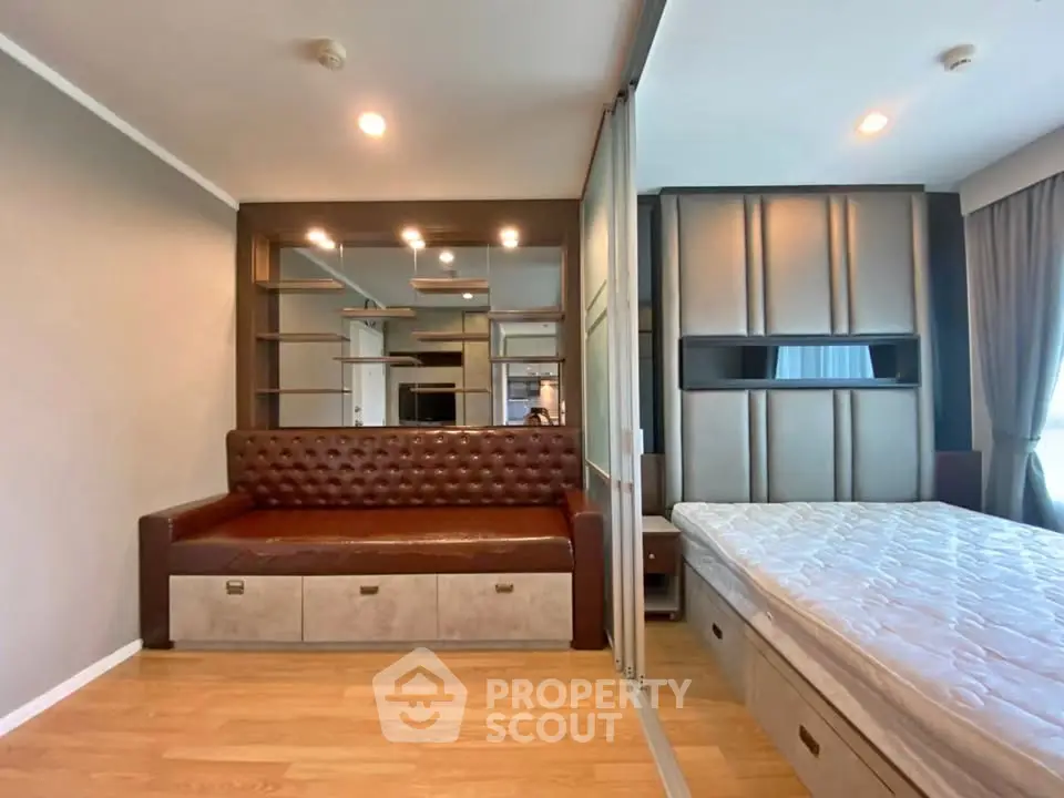 Modern bedroom with stylish built-in furniture and cozy lighting