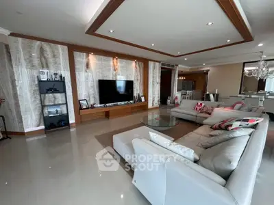Spacious modern living room with elegant decor and large sectional sofa