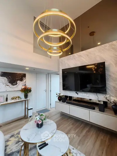 Luxurious modern living room with high ceiling and elegant lighting
