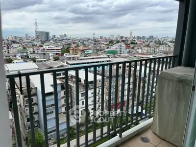 Stunning cityscape view from a high-rise balcony, perfect for urban living enthusiasts.
