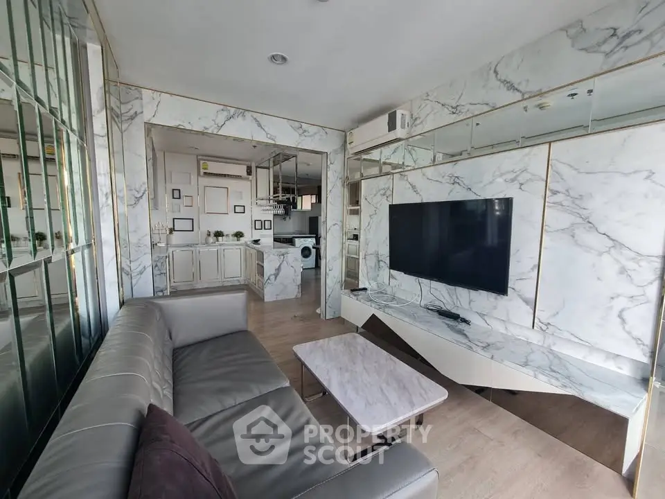 Luxurious modern living room with marble accents and sleek furniture