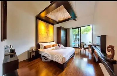 Luxurious modern bedroom with elegant decor and large window view