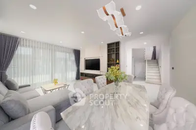 Luxurious modern living room with elegant dining area and stylish decor