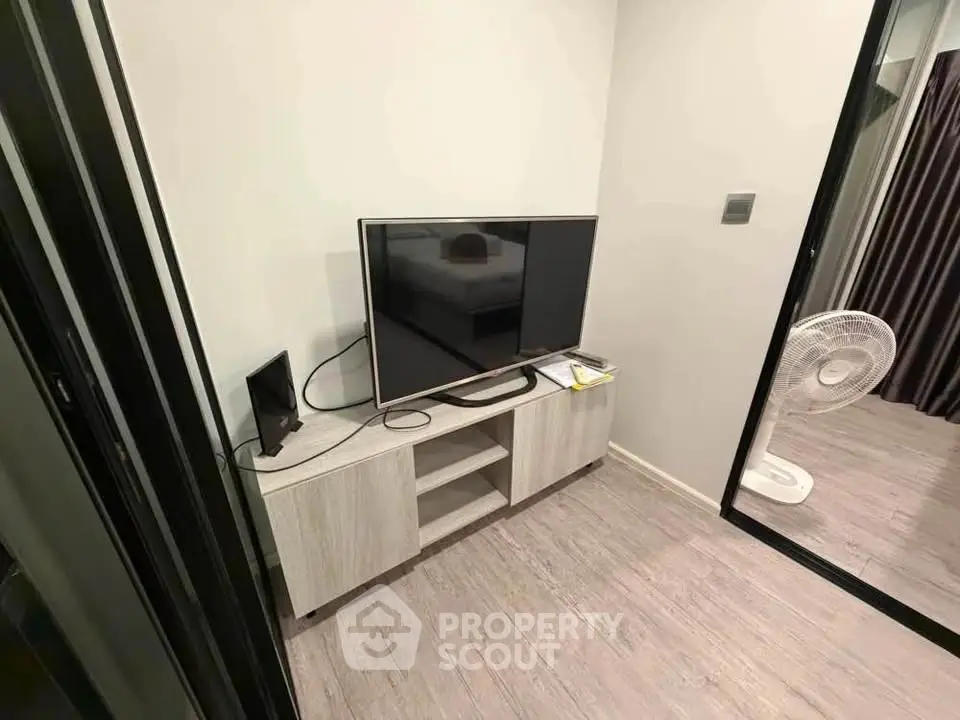 Modern living room with sleek TV setup and stylish decor