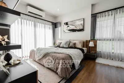 Luxurious modern bedroom with elegant decor and natural light