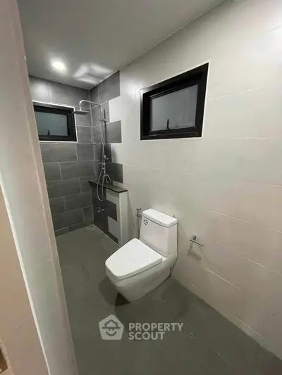 Modern bathroom with sleek design and contemporary fixtures.