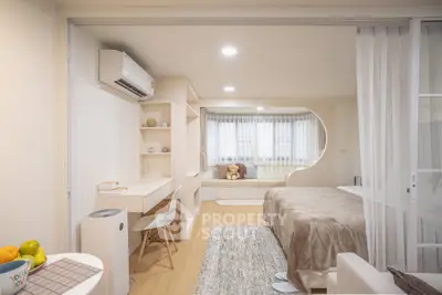 Modern bedroom with cozy study area and stylish decor
