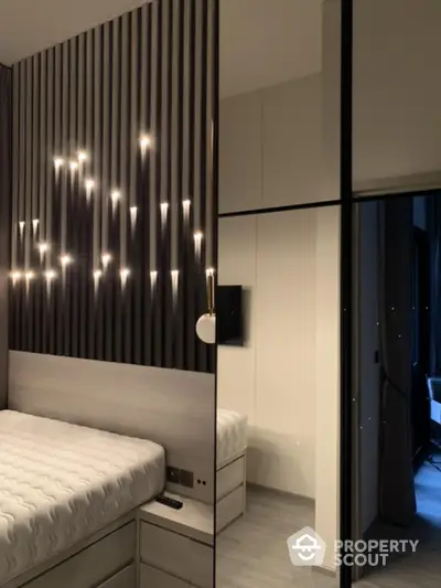 Modern bedroom with stylish lighting and sleek design