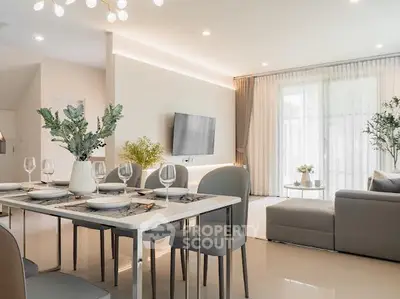 Modern living room with elegant dining area and natural light