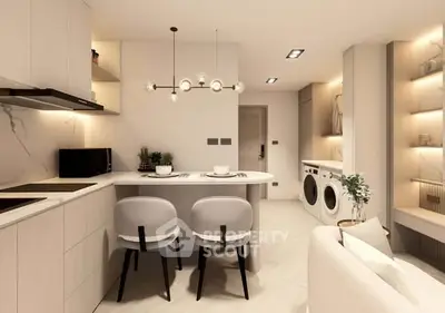 Modern kitchen with open layout, stylish lighting, and built-in appliances in a cozy apartment.