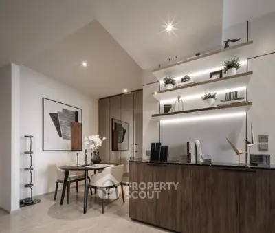 Modern dining area with sleek decor and stylish shelving in a contemporary apartment.