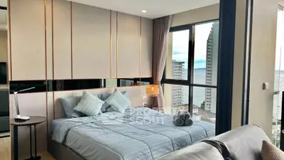 Luxurious bedroom with stunning ocean view and modern decor