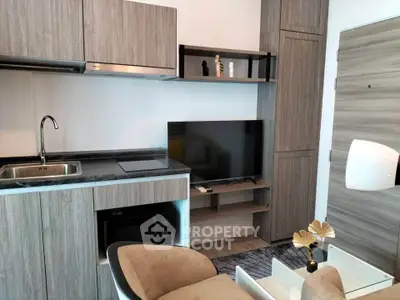 Modern compact living room with integrated kitchen and stylish decor