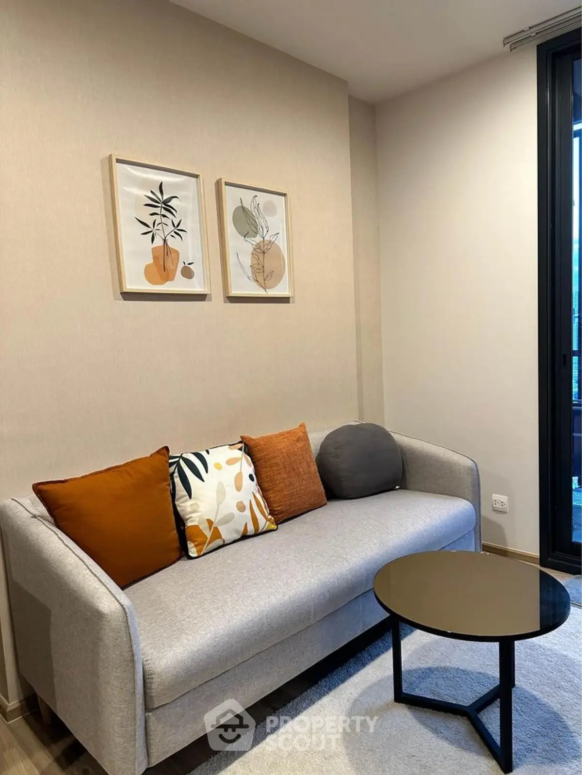 Modern living room with stylish sofa and decor, perfect for cozy relaxation.