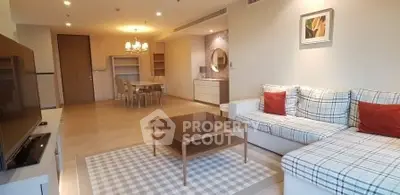 Spacious modern living room with stylish furniture and open dining area