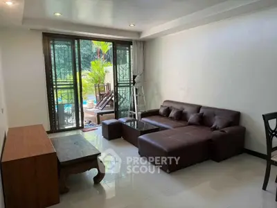 Spacious living room with modern furniture and garden view