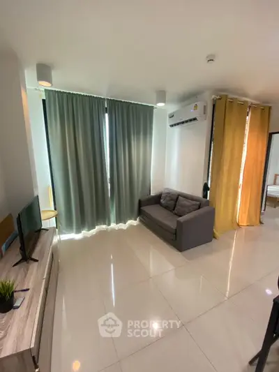 Modern living room with sleek furniture and natural light