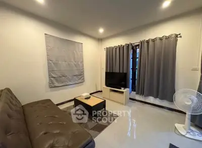 Cozy living room with modern decor and natural light