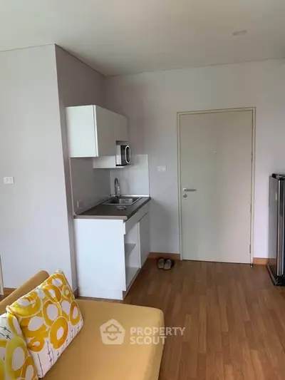 Cozy apartment interior with compact kitchen and stylish decor