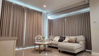 Elegant living room with plush sofa and modern decor