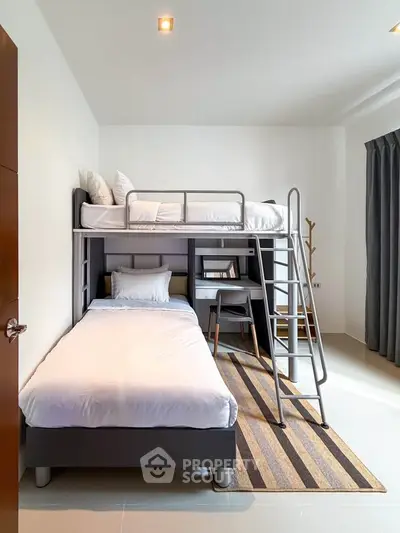 Modern bedroom with stylish bunk bed and cozy decor