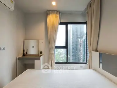 Modern bedroom with city view, featuring a large window and minimalist decor.