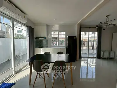 Modern kitchen with open layout and stylish dining area