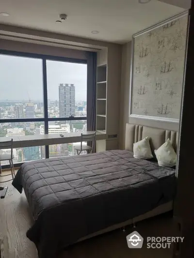 Modern bedroom with city view and stylish decor