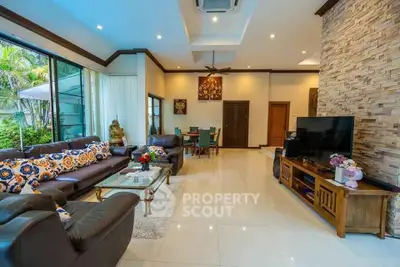 Luxurious living room with modern decor and garden view