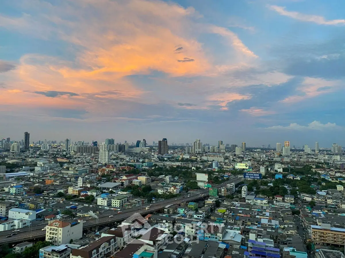 Stunning cityscape view at sunset with vibrant sky over urban skyline
