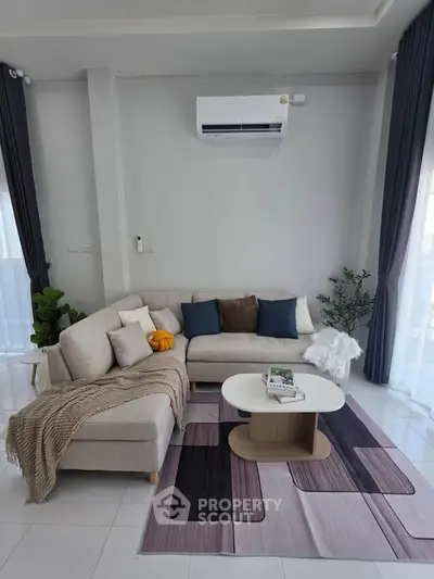 Modern living room with stylish sectional sofa and chic decor