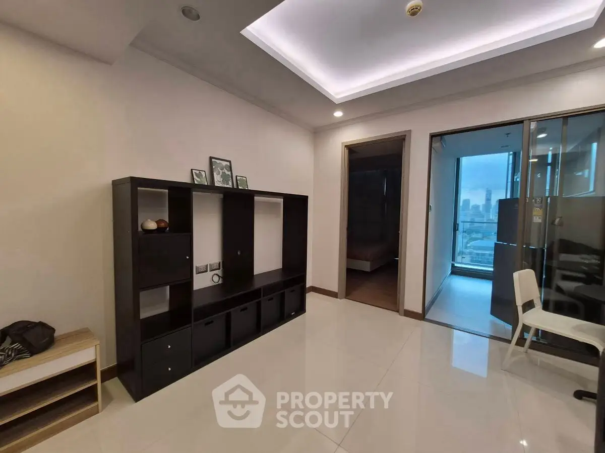 Modern living room with sleek shelving and city view