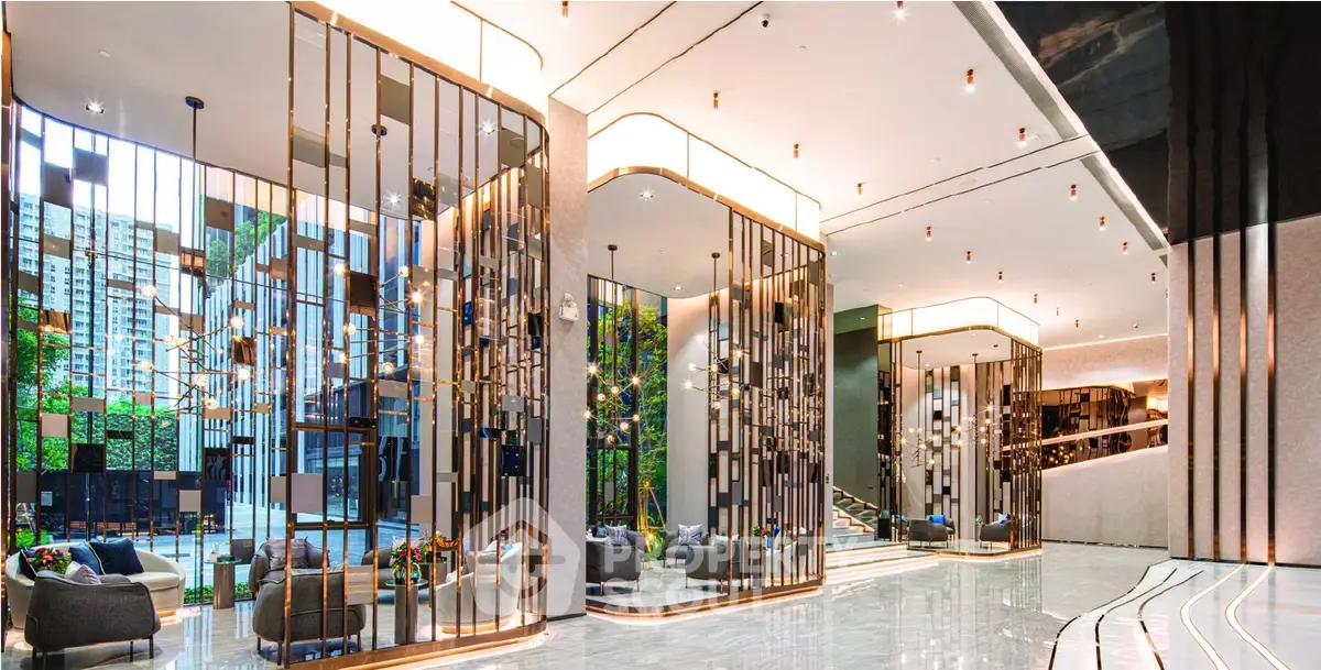 Luxurious modern building entrance with elegant design and spacious seating area.