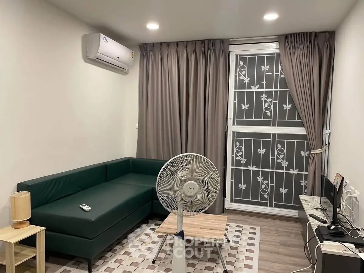 Cozy living room with modern decor and air conditioning