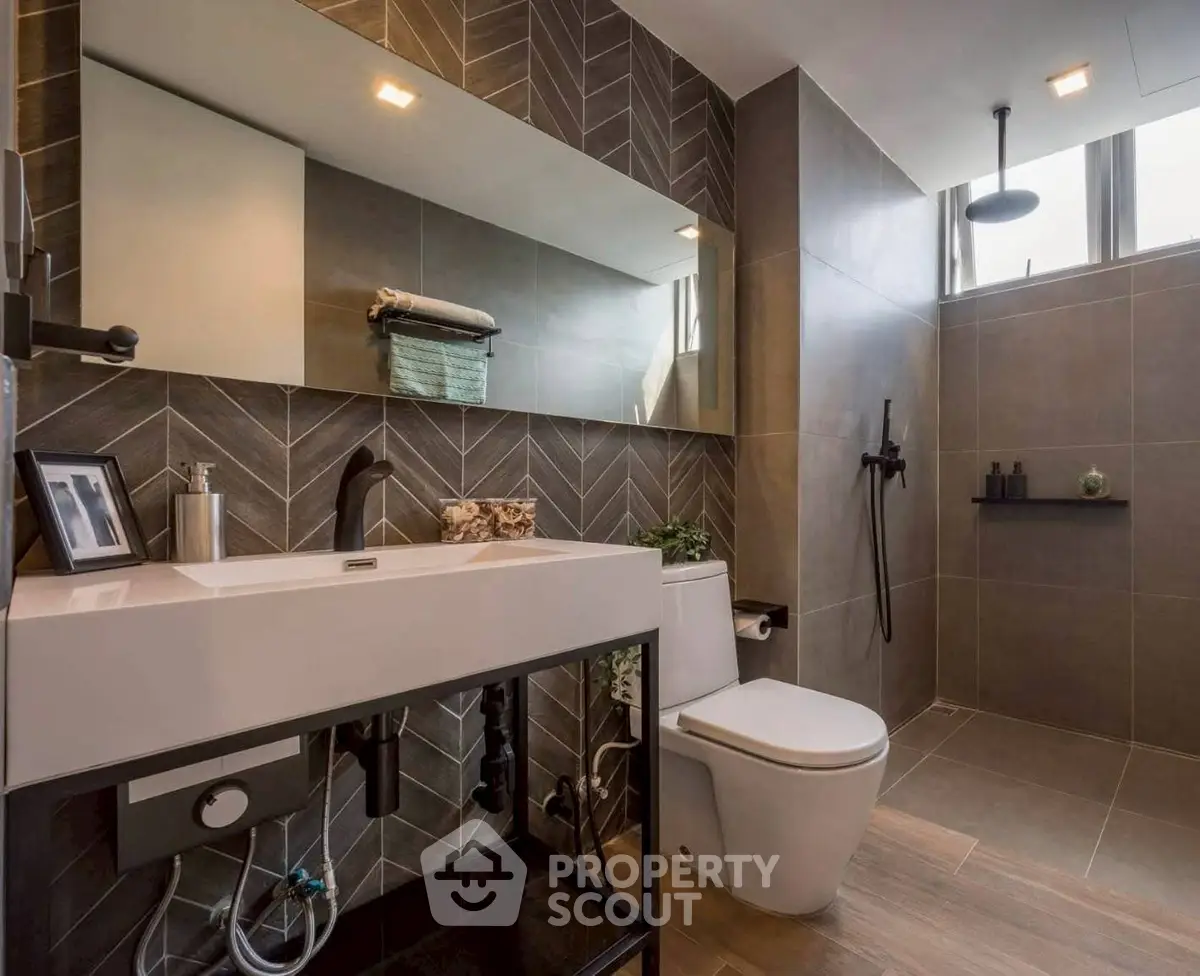 Modern bathroom with sleek design and rainfall showerhead