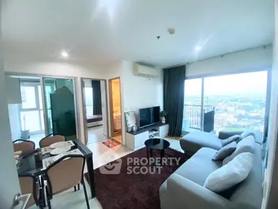 Spacious modern living room with panoramic city view and elegant decor
