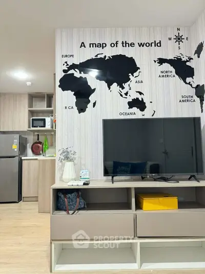 Modern living room with world map wall art and sleek kitchen area, perfect for urban living.