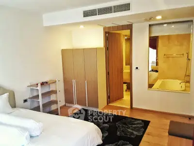 Modern bedroom with ensuite bathroom and stylish decor