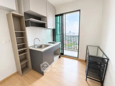 Modern kitchen with balcony view in a stylish apartment