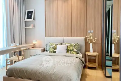Elegant bedroom with modern decor and natural light, featuring a cozy bed and stylish wooden accents.