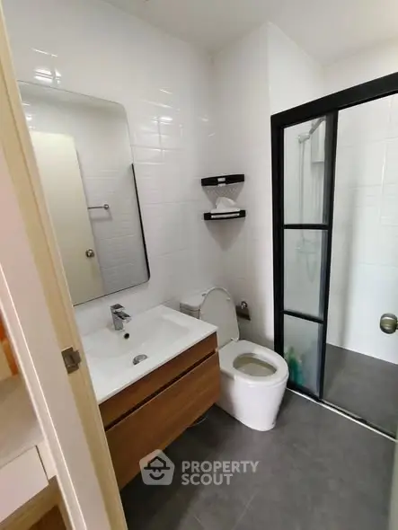 Modern bathroom with sleek design and glass shower enclosure