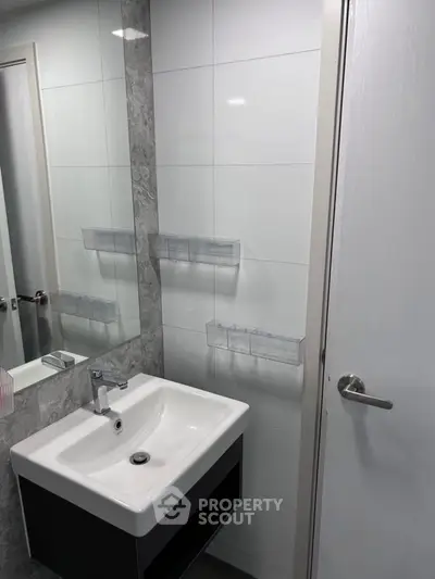 Modern bathroom with sleek sink and minimalist design