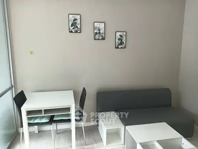 Modern living room with minimalist furniture and wall art