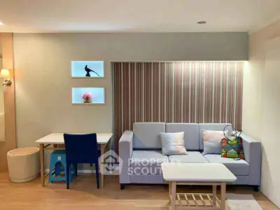 Modern living room with stylish decor and cozy seating area