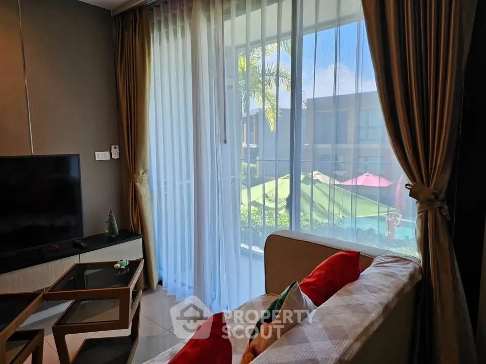 Stylish living room with modern decor and large windows overlooking a lush garden.